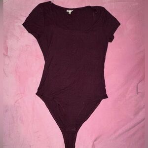 Burgundy/Maroon ribbed body suit.